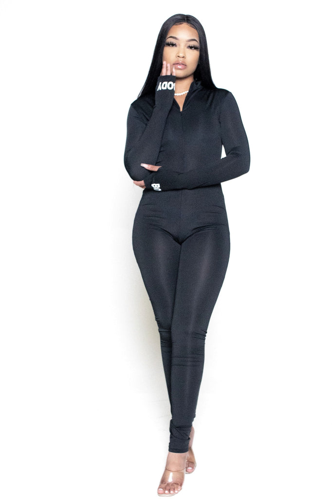 Jumpsuit. With a white "Body" print design, open thumb, long sleeves, mock neck, zipper closure