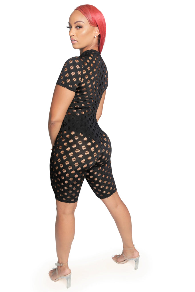 Romper. Featuring a see through design. This Romper features short sleeves and a back zipper closure
