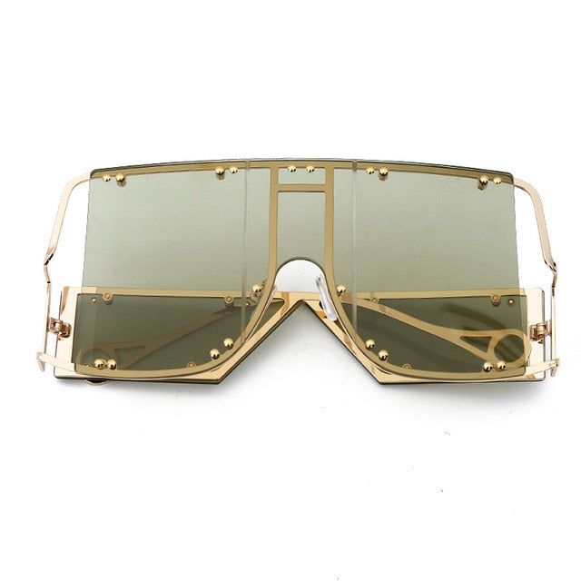 army green color pop shades. Featuring an gold frame oversized square design trimmed in gold.  Theses special sunglasses change colors in different lighting. 