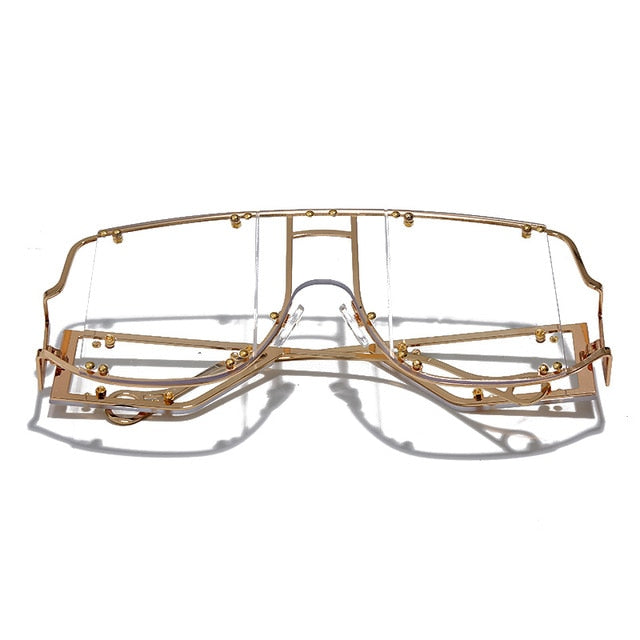 clear color pop shades. Featuring an gold frame oversized square design trimmed in gold.  Theses special sunglasses change colors in different lighting. 