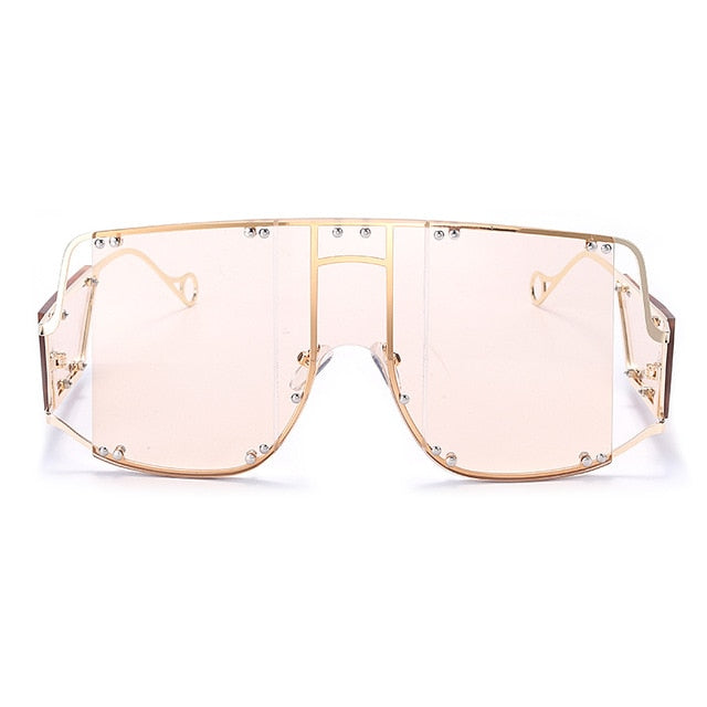 light pink color pop shades. Featuring an gold frame oversized square design trimmed in gold.  Theses special sunglasses change colors in different lighting. 
